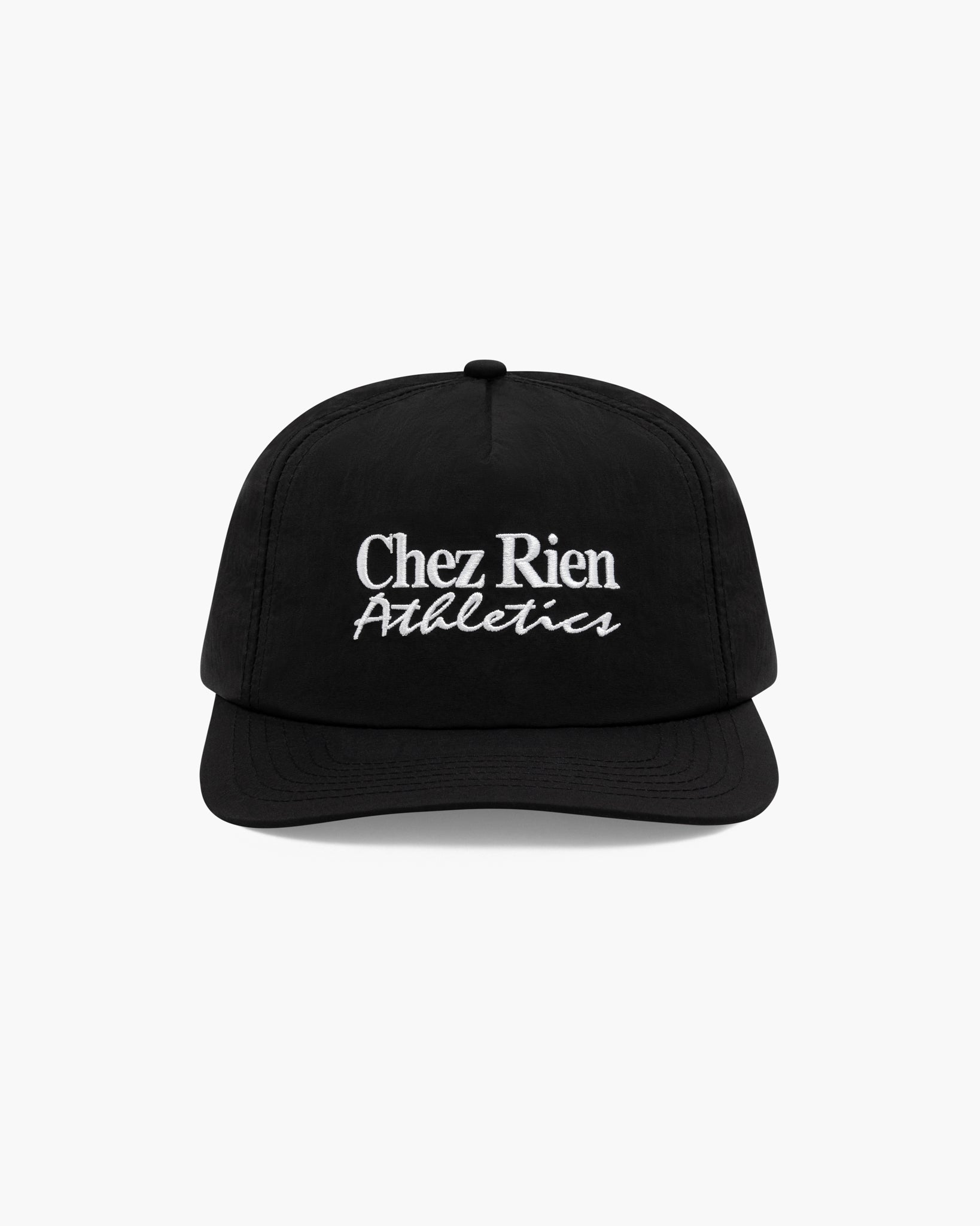A black baseball cap with 'Chez Rien Athletics' embroidered in white on the front, set against a plain light gray background.